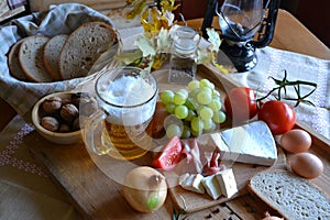 Cheese, bread, onions, wine, tomatoes and beer