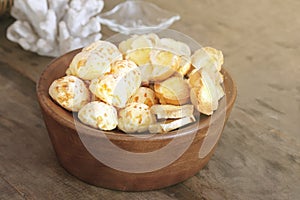 Cheese bread and toast in a wooden basket