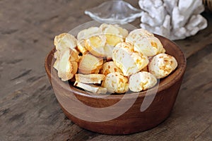 Cheese bread and toast in a wooden basket