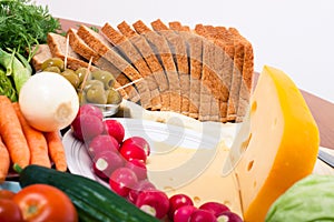 Cheese, bread and vegetable