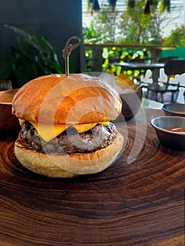 Cheese burger in natural day light cafe