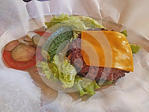 Cheese burger on salad