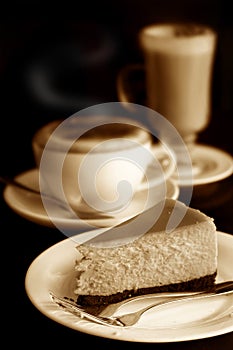 Cheese cake with cappuccino and cafe latte photo
