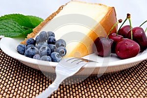 Cheese Cake, Cherries And Blueberries