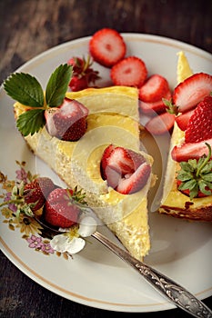 Cheese cake on wooden table. Selective focus