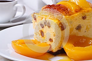 Cheese casserole with raisins and peaches closeup