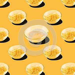 Cheese and cheese sauce on a yellow background