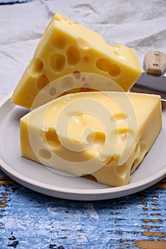 Cheese collection, french hard cheese with holes emmentaler