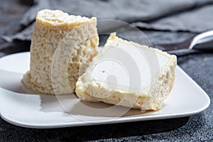 Cheese collection, French soft Chabichou of Poitou cheese made from goat milk in region Nouvelle-Aquitaine, France