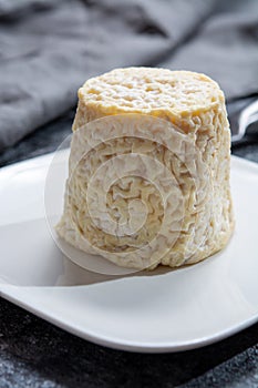 Cheese collection, French soft Chabichou of Poitou cheese made from goat milk in region Nouvelle-Aquitaine, France