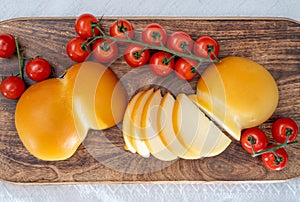 Cheese collection, Italian cheese scamorza, caciocavallo, provolone made from cow milk in South Italy yellow smoked cheese