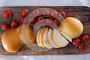 Cheese collection, Italian cheese scamorza, caciocavallo, provolone made from cow milk in South Italy yellow smoked cheese