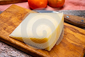 Cheese collection, piece of hard Spanish manchego curado cheeses photo