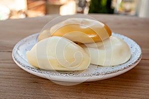 Cheese collection, variety of Italian cow milk cheese flat scamorza