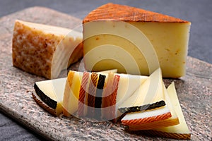 Cheese collection, variety of Spanish manchego cheese made from cow and goat milk photo