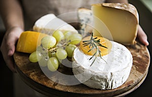 Cheese and grapes on the plater
