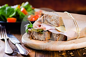 Cheese and ham sandwich of fresh organic bread