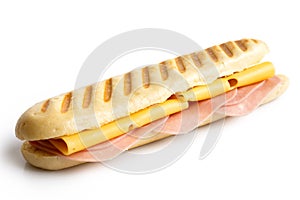 Cheese and ham toasted panini. Isolated on white.