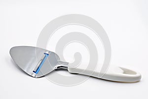 Cheese knife with plastic handle on white