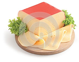 Cheese with lettuce on a white background.Cheese with lettuce on a white background