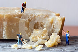 Cheese mining process by miniature men