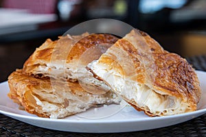Cheese pie plate in Serbian style - Burek sa sirom photo