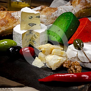 cheese plate, appetizers and wine, horizontal. Copyspace for text