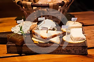 Cheese plate of Asturian cheese: Cabrales, Afuegaâ€™l Pitu, Vidiago, Queso de Oveja sheep milk cheese and Ahumados smoked cheese