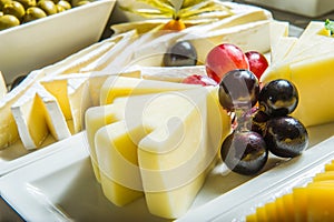 Cheese plate with berris.