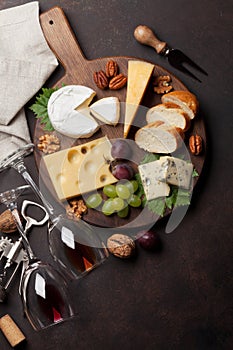 Cheese plate with grapes and nuts