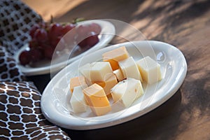 Cheese Plate with Red Seedless Grapes`