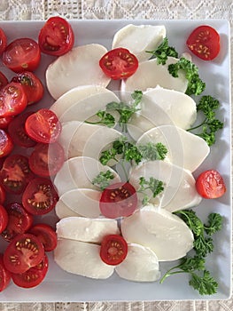 Cheese plate with tomatoes 1