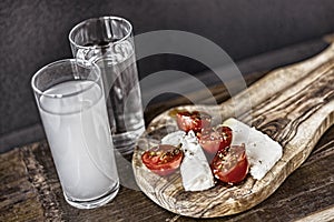 Cheese plate with Turkish and Greek Drink Raki