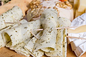 Cheese plate variation on a wooden table