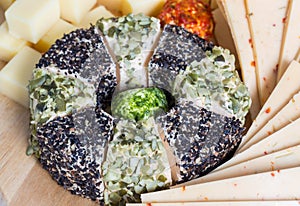 Cheese plate variation on a wooden table