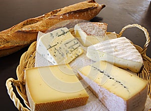 Cheese platter and a baton bread