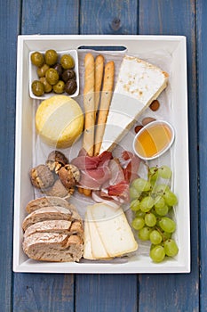 Cheese platter on blue