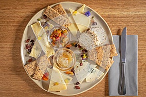 Cheese platter with relish, chutney and crackers