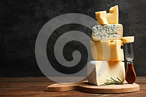 Cheese platter with rosemary and fork