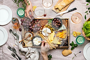 Cheese platter for summer outdoor party, top down view