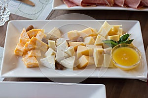 Cheese platter in a white platee