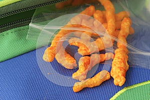 Cheese Puff Travel Snacks on Backpack