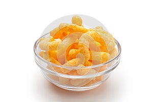 cheese puffs in a glass bowl