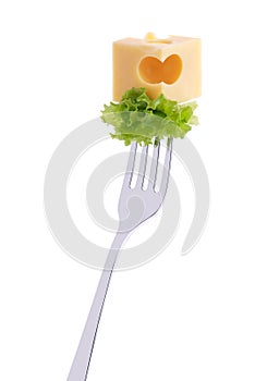 Cheese and salad on a fork