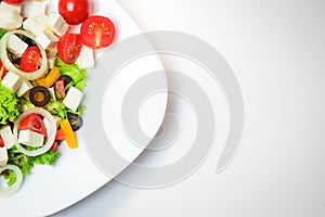 Cheese salad with vegetables isolated close-up with space for text