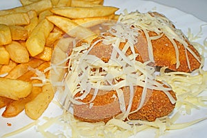 Cheese schnitzel with fries