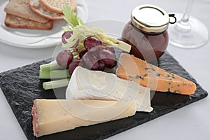 Cheese selection on slate platter