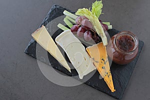 Cheese selection on slate platter