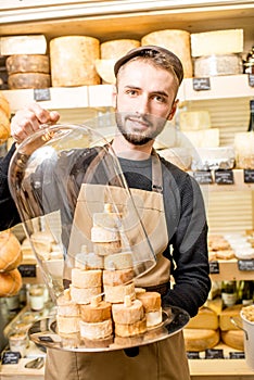 Cheese seller at the shop