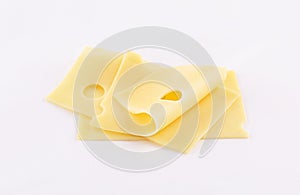 Cheese slices on white background